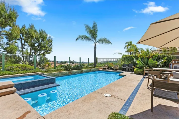 Spacious backyard with gorgeous pool & spa