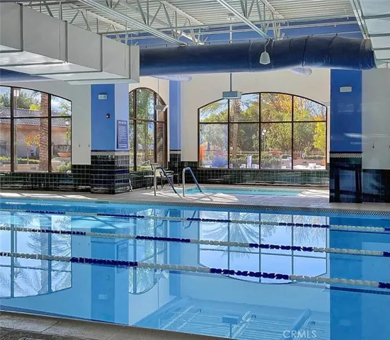 An indoor lap pool and spa along with an amazing fitness center with track (not pictured)