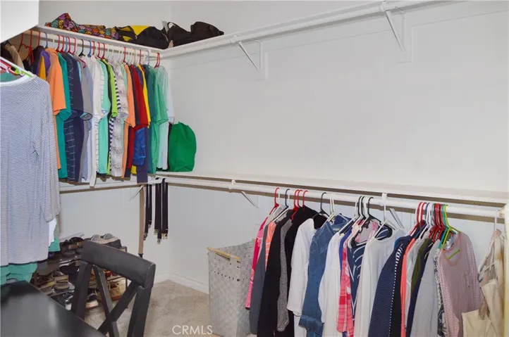 Spacious walk-in closet with outlet added for vanity (or ironing board or whatever your heart desires)