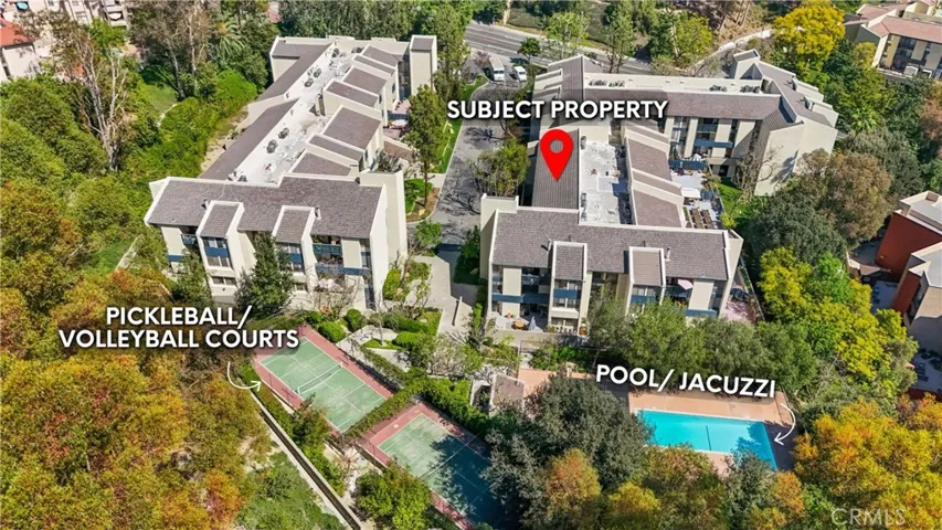 Townhome with a pool, a covered jacuzzi, pickleball court, volleyball court, gym and recreation room
