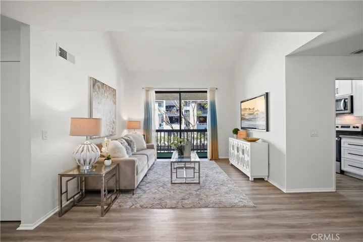 Open-concept living area with vaulted ceilings