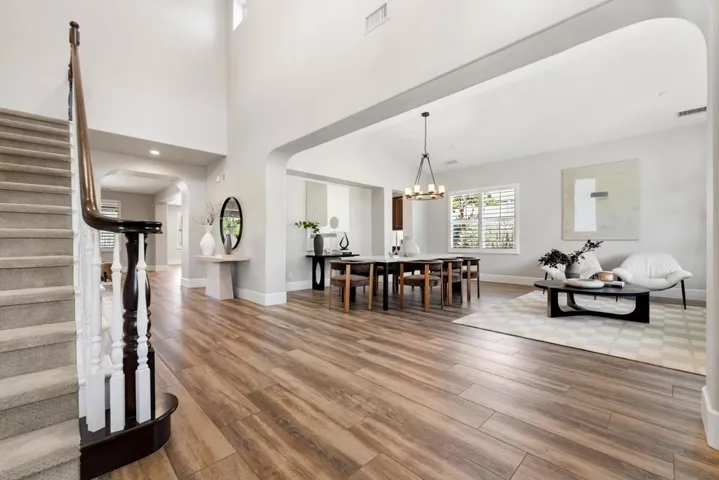 Entry with views to living and dining room. Office is to the left of the entry