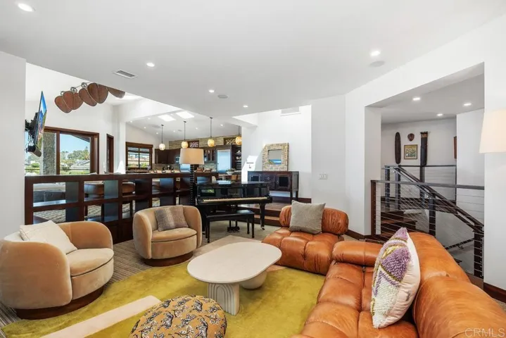View showing both living rooms and kitchen