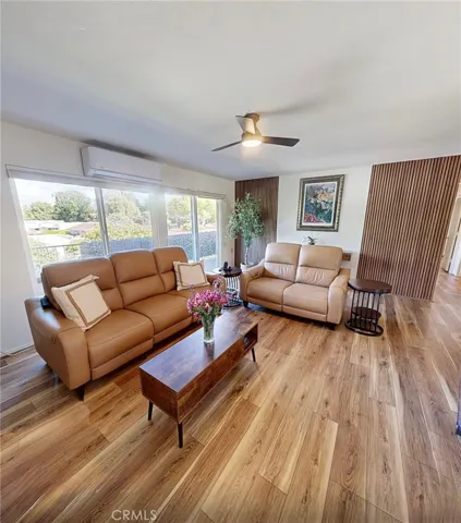 Light-filled living space featuring individual mini-split systems in each room, providing personalized comfort and energy-efficient climate control throughout.