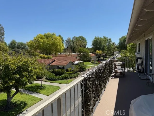 Extra-long private terrace with peaceful, elevated views, offering the perfect space to relax, enjoy morning coffee, and take in the beautifully landscaped surroundings.
