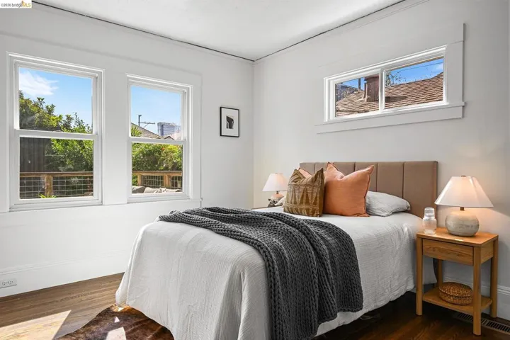 Bedroom featuring dark wood-style flooring