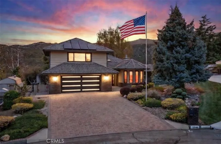Exterior twilight image, American flag has been digitally added