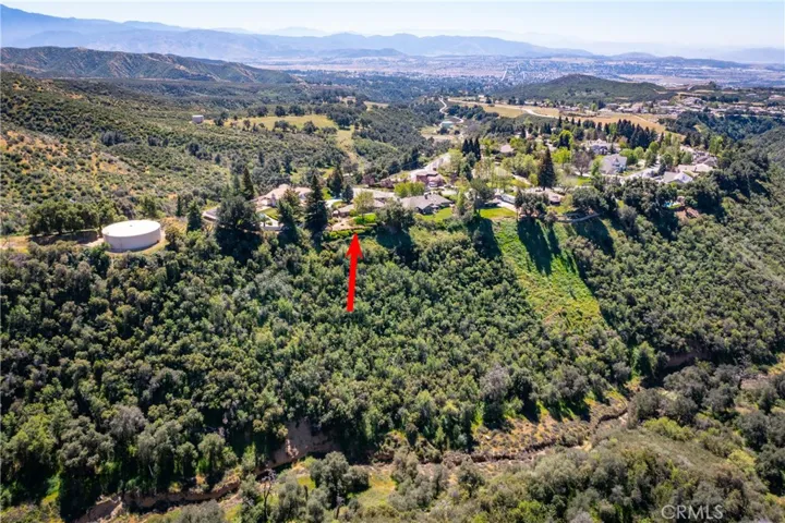 Aerial Image of slope, this slope is steep and not useable but provides no neighbors behind you but the native animals and expansive views