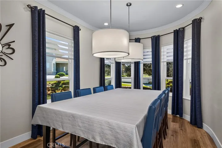 Formal dining room with expansive windows