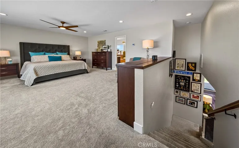 Elevated loft style primary bedroom