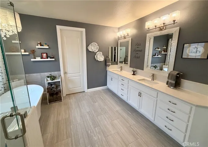 Primary bathroom. Walk-in closet at end