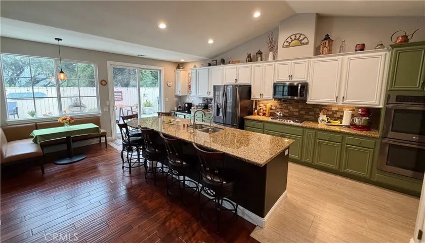 Travertine tile in kitchen. Breakfast nook.