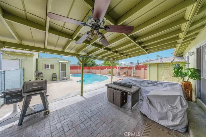 Another view of the patio with a BBQ