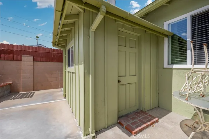 Cabana with storage and toilet and sink. to keep wet feet out of the house :)
