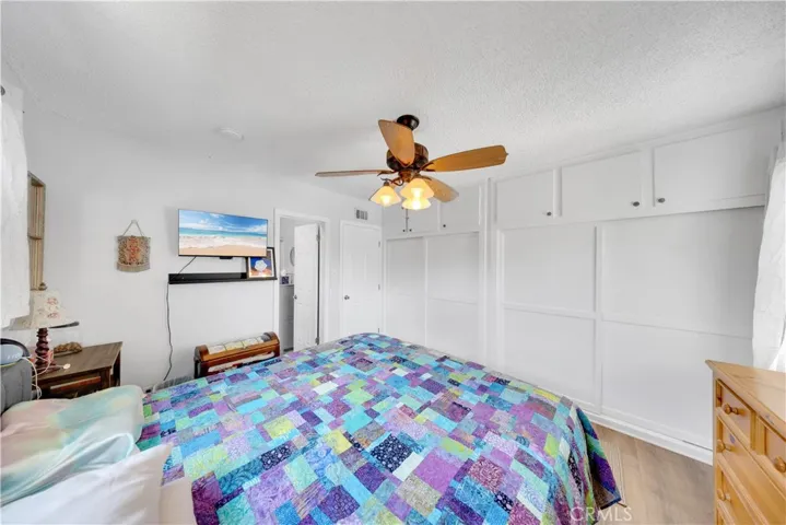 another view of the Primary bedroom and and the storage space.
