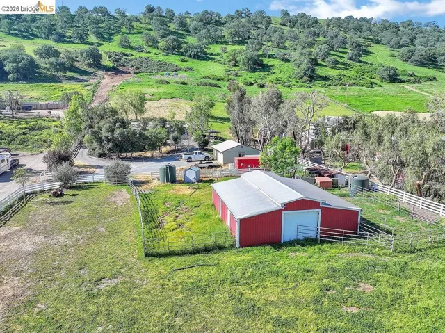 Overview of rural landscape featuring a pastoral area