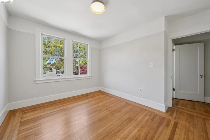 Empty room with wood finished floors