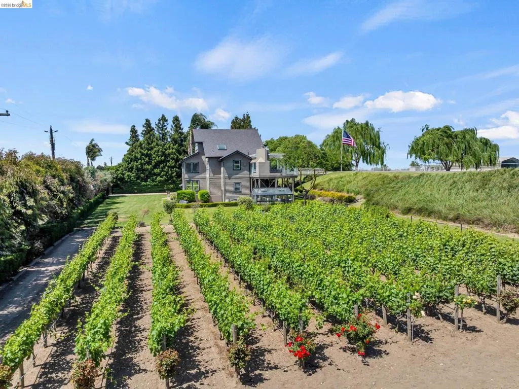 View of front facade featuring agricultural plots and a view of rural / pastoral area