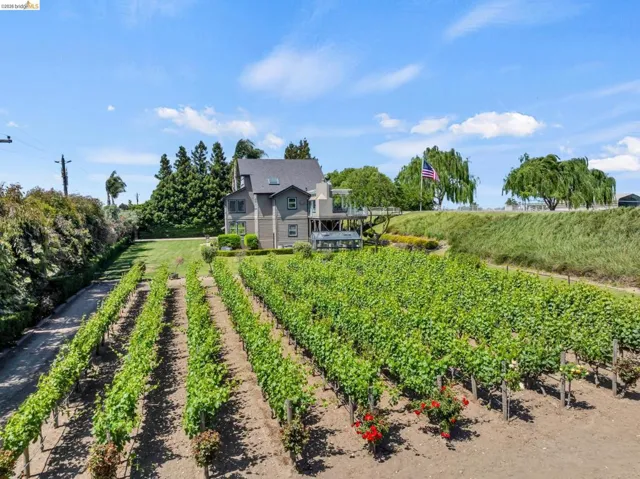 View of front facade featuring agricultural plots and a view of rural / pastoral area
