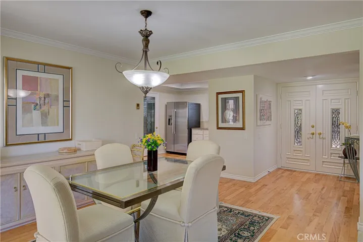 As you enter the beautiful Entry Double doors you are greeted with a foyer and a Furnished, Open and spacious floor plan