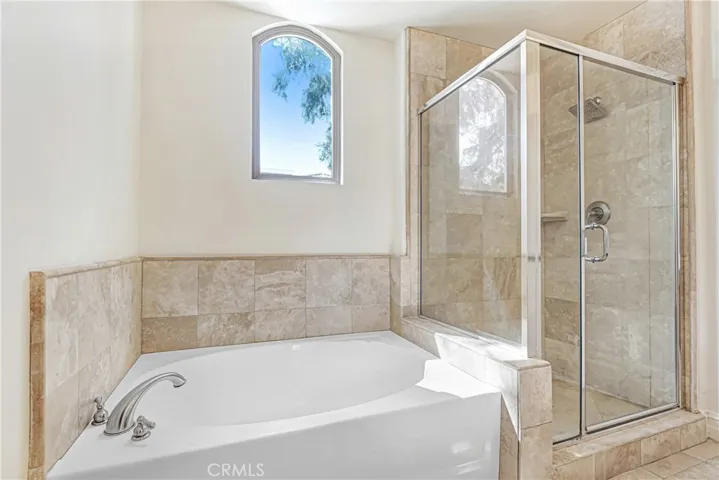 Primary bath with bathtub and shower