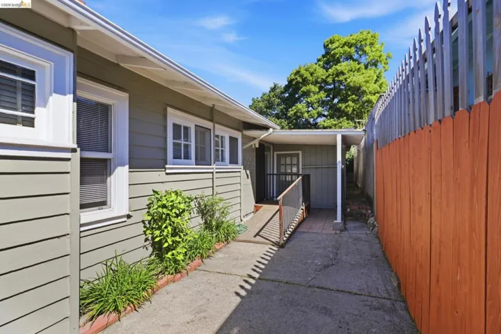 View of side of property featuring a patio area