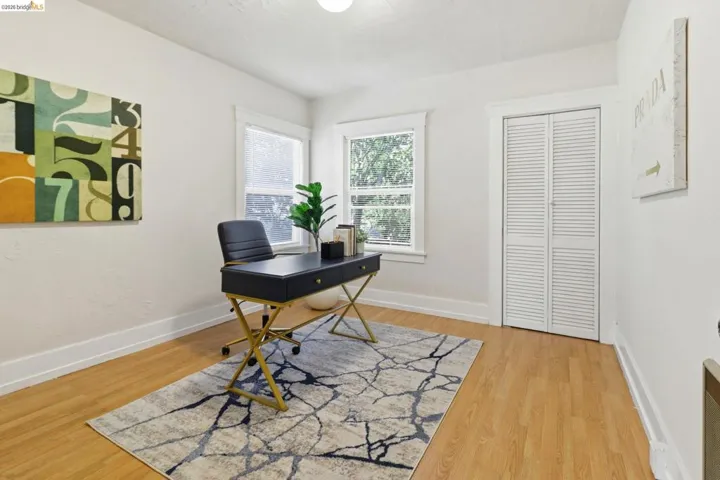 Office featuring baseboards and light wood-style floors
