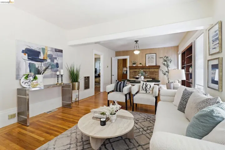 Living room with wood finished floors and wooden walls