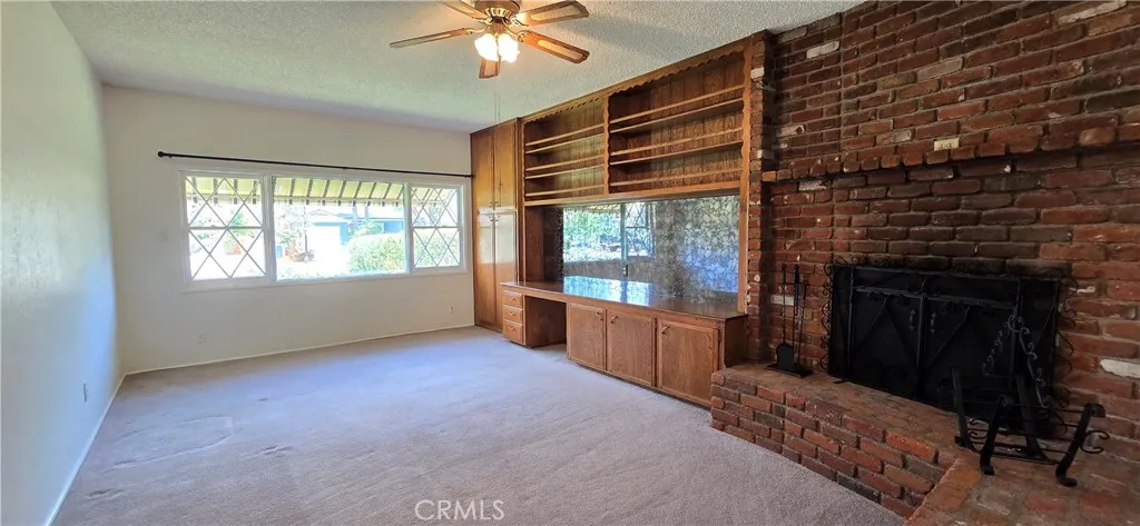 Bonus Room / Den with Fireplace