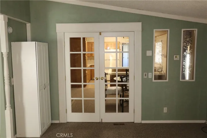 French doors to dining and kitchen