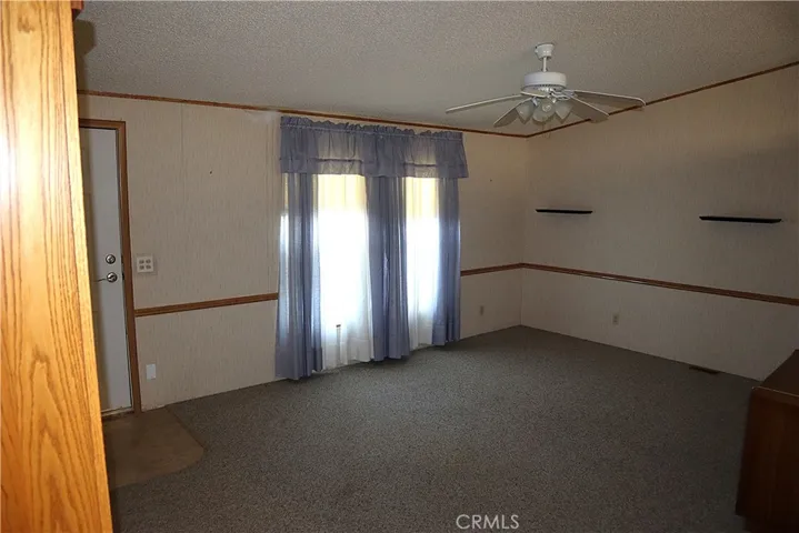 Large living room with front door access