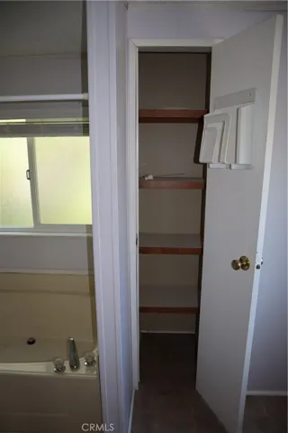 Primary Bathroom linen storage