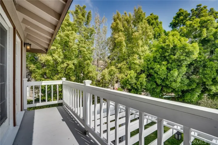 Private deck off of the primary suite w/serene views of the backyard!