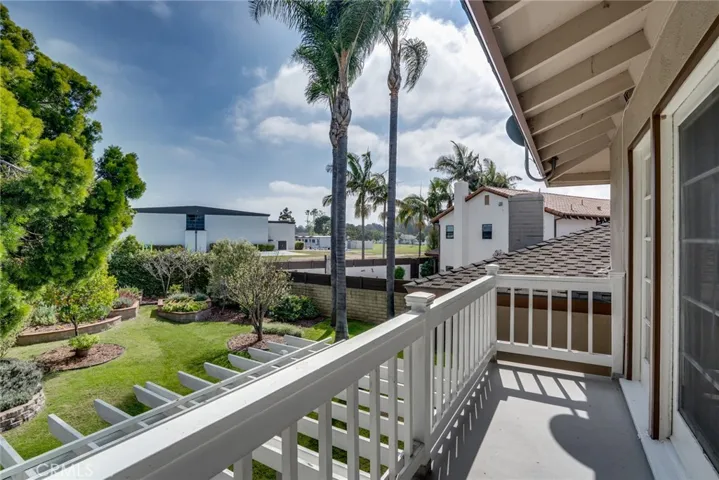 Private deck off of the primary suite w/serene views of the backyard!