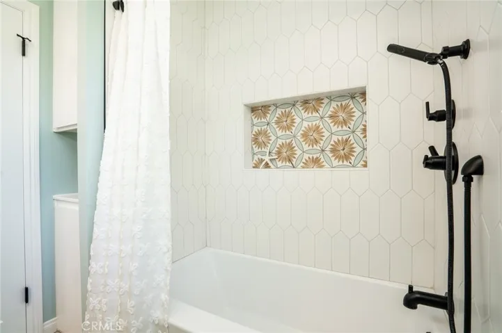 Upstairs hall bath has a bathtub/shower!