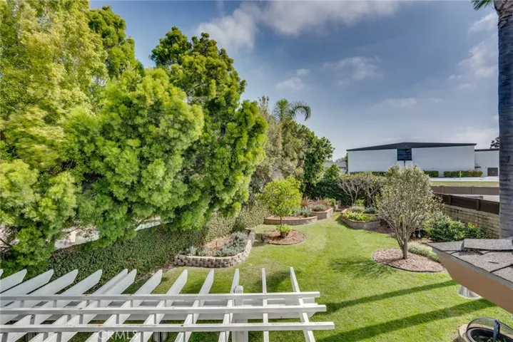 Private deck off of the primary suite w/serene views of the backyard!