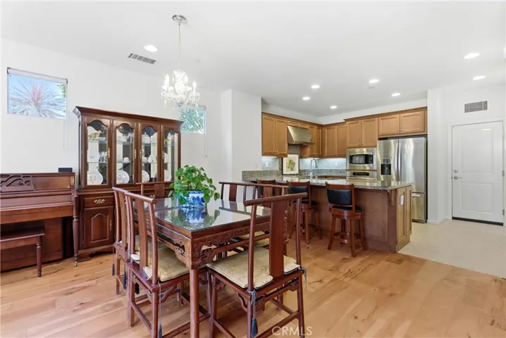 Open dining area seamlessly connected to the kitchen, creating a natural flow for hosting and everyday living.