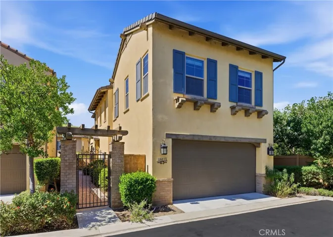 Beautifully maintained exterior with timeless architectural details, attached two-car garage, and inviting curb appeal.