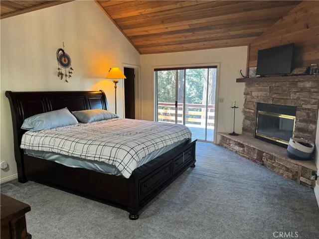 Master Bedroom with Fireplace and upper deck