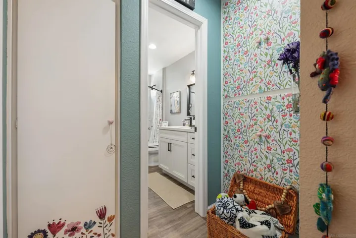 Looking into bathroom from hall.