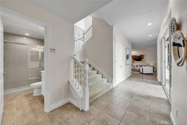 The lower-level bathroom is equipped with a walk-in shower.