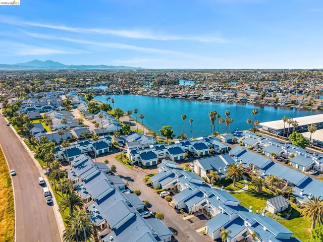 Aerial view of residential area with a water and mountain view