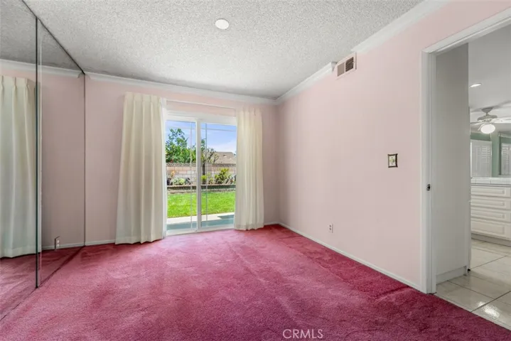 separate dining room with patio door to the backyard
