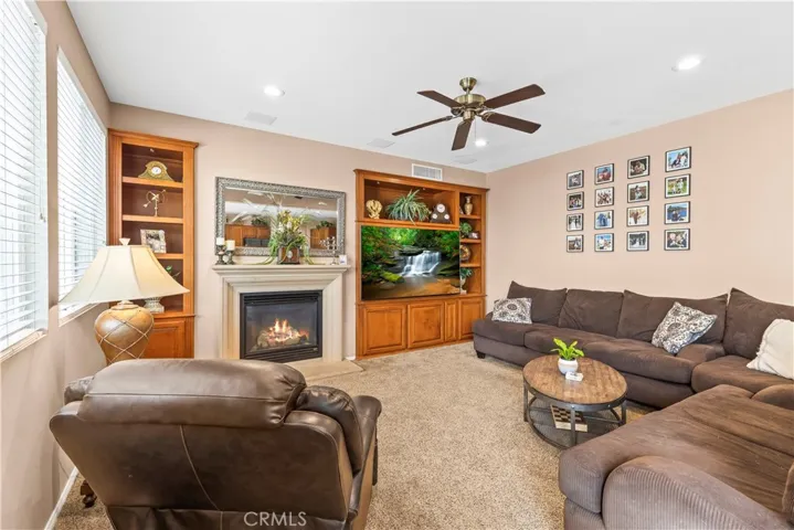 Generous Family Room with custom built-ins.