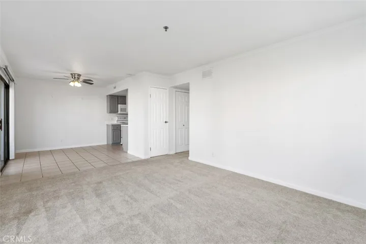 another angle of the family and kitchenette