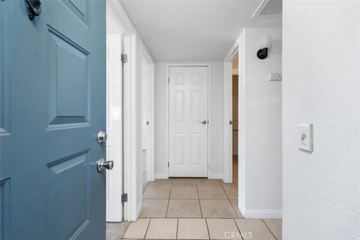 Coat closet at the end of the hall