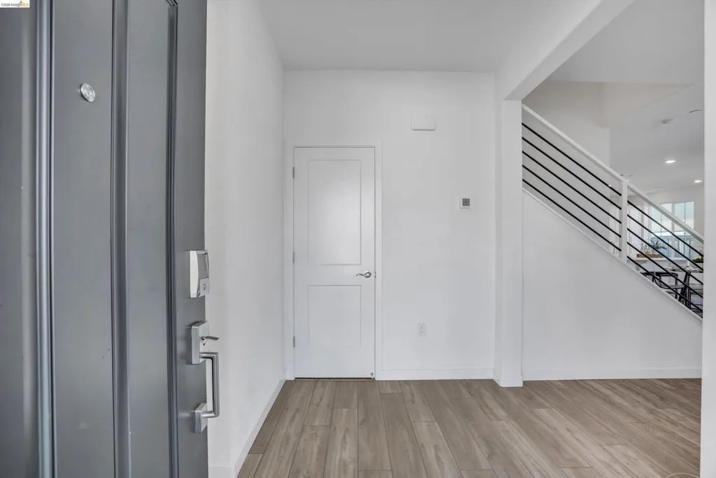 Foyer featuring light wood-style flooring and recessed lighting