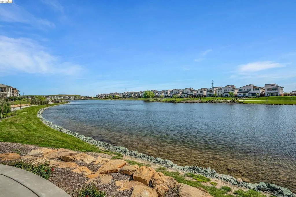 Water view with nearby suburban area
