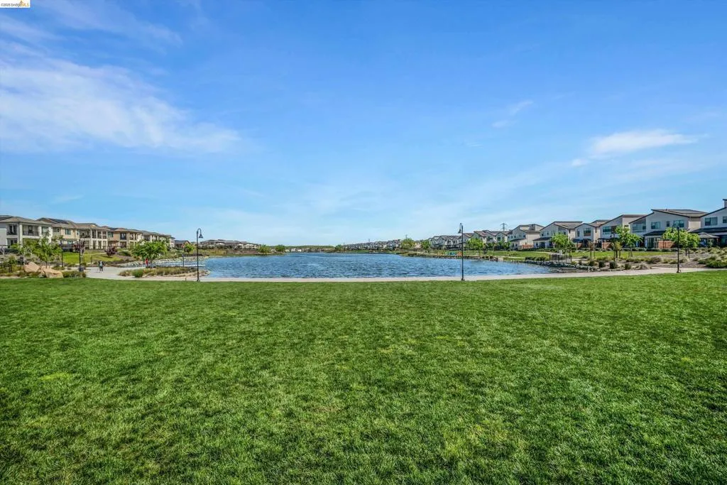 Water view with nearby suburban area