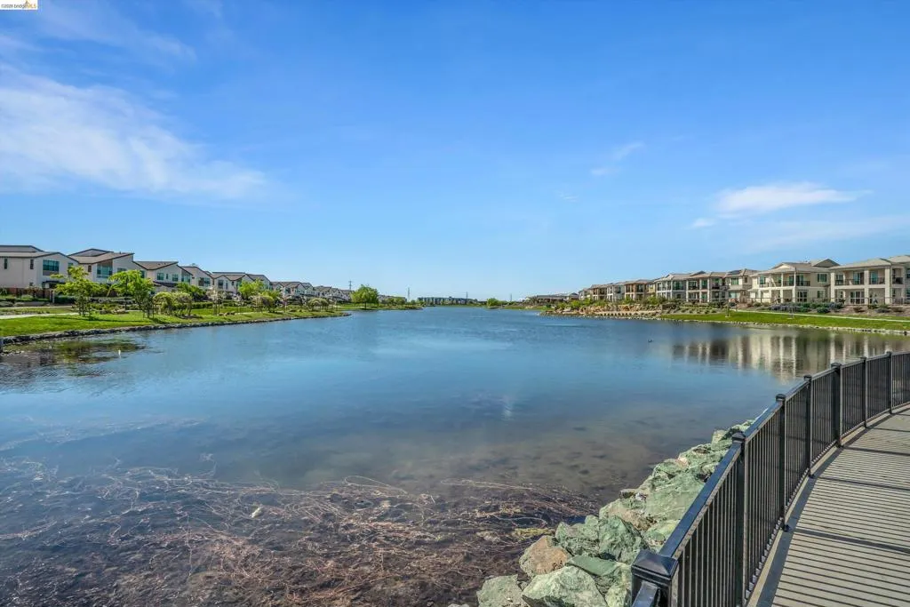 Water view featuring nearby suburban area